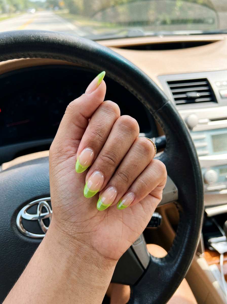 Lime slice French tip nails for summer fruits nail art 2026. Playful short squoval nails with a clear base and bright lime green jelly tips.